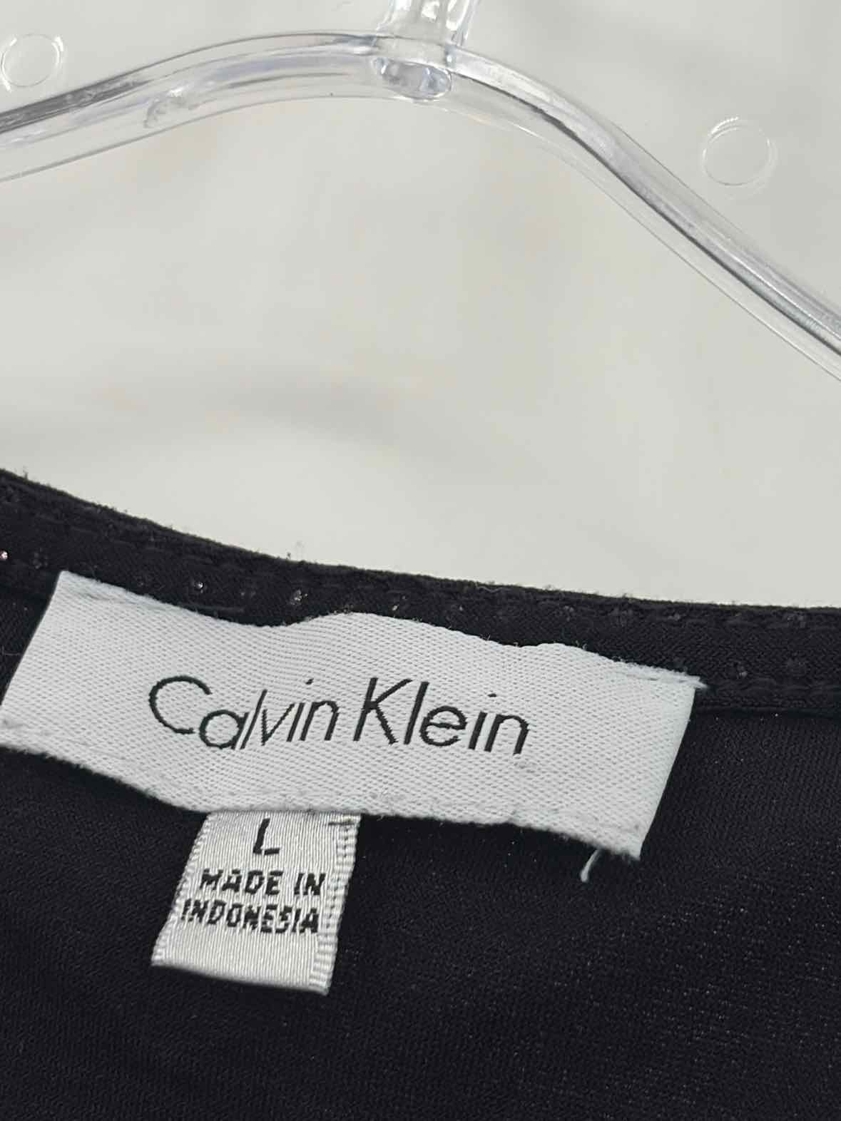 Calvin Klein Black Size Large Blouse | True Fashionistas.