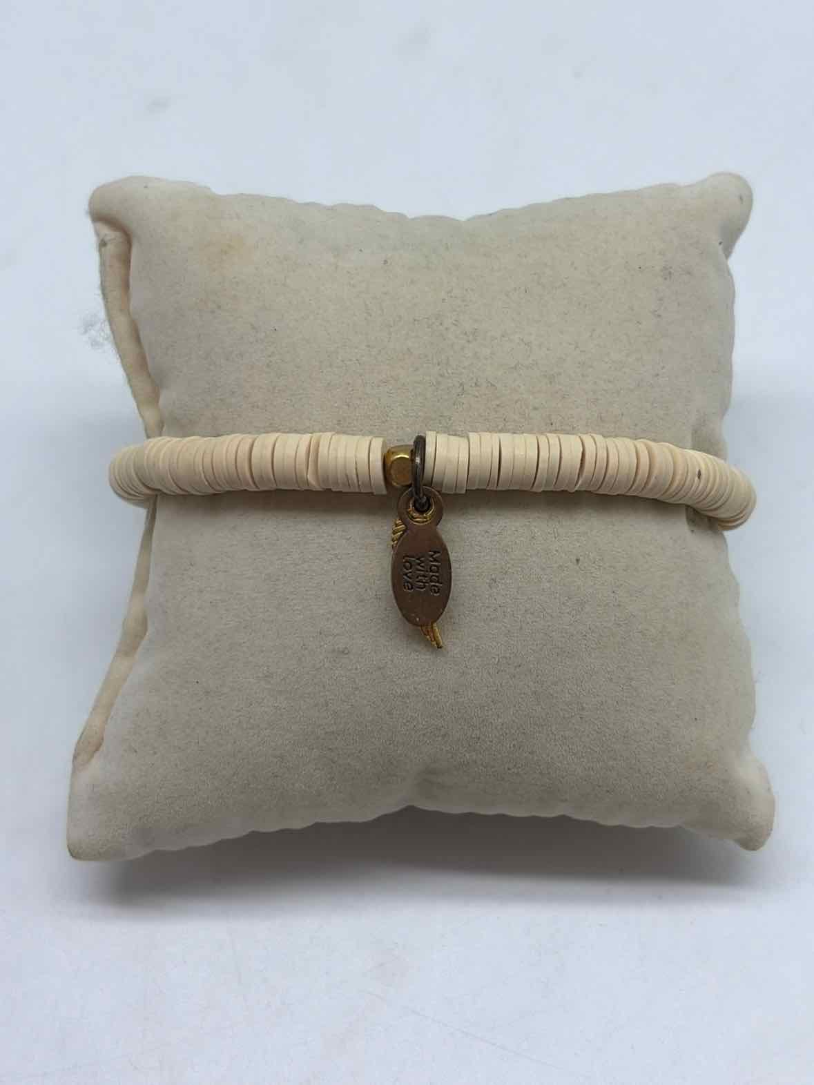 Pre-Owned OMI Ivory Stretchy Beaded Bracelet | True Fashionistas.
