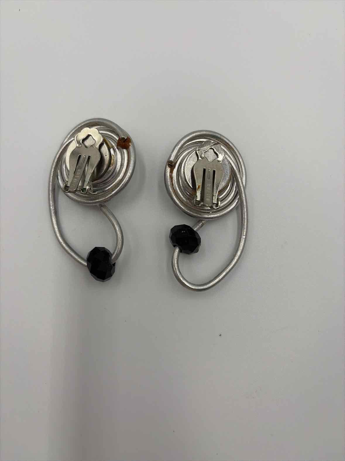 Jeff Lieb Silver clip Drop Earrings | True Fashionistas.