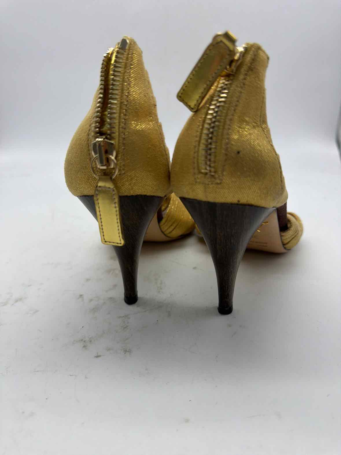 Pre-Owned Charlotte Olympia Gold Size 8.5 Caged Heels | True Fashionistas.