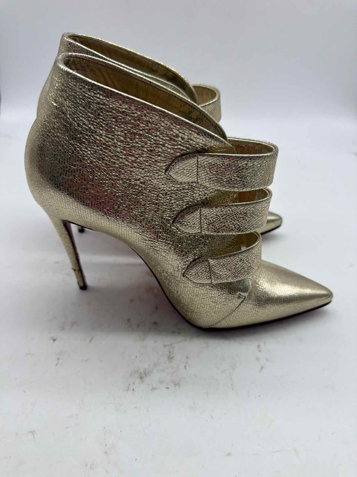 Pre-Owned Christian Louboutin Gold Size 6.5 Ankle Boot Boots | True Fashionistas.