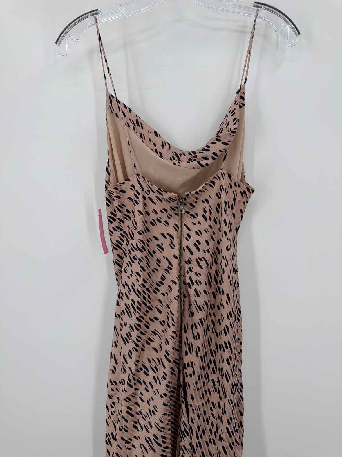 Pre-Owned Alice + Olivia Tan Size 10 Midi Sleeveless Dress | True Fashionistas.