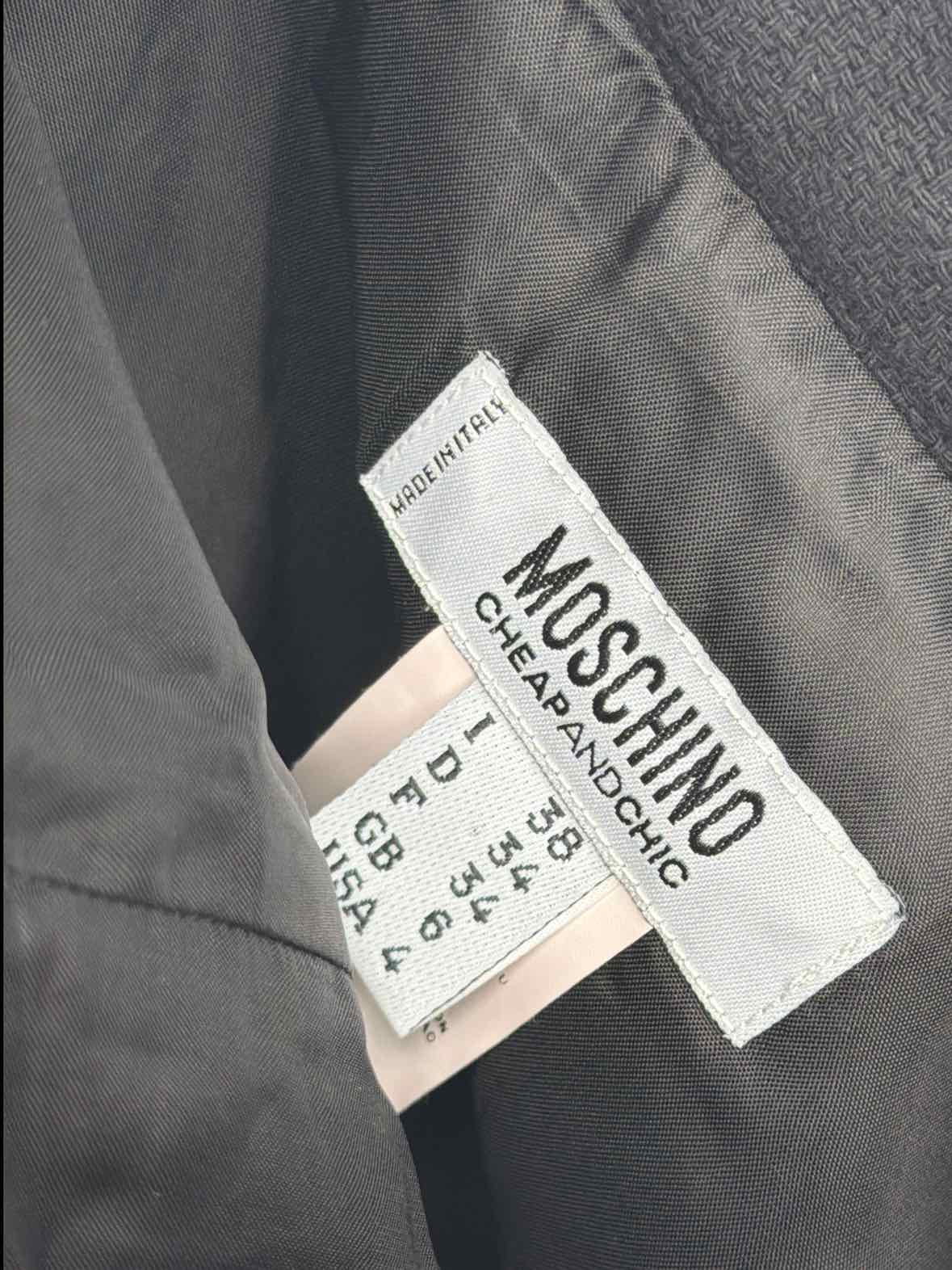 Pre-Owned Moschino Black Size 4 Pencil Skirt | True Fashionistas.