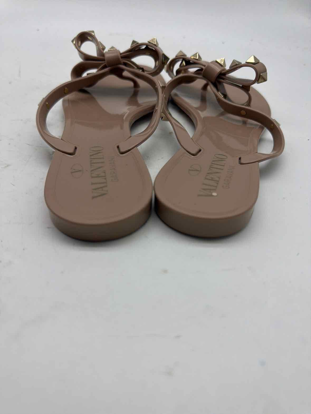 Pre-Owned Valentino Tan Size 36 Jelly Rockstud Thong Sandals | True Fashionistas.