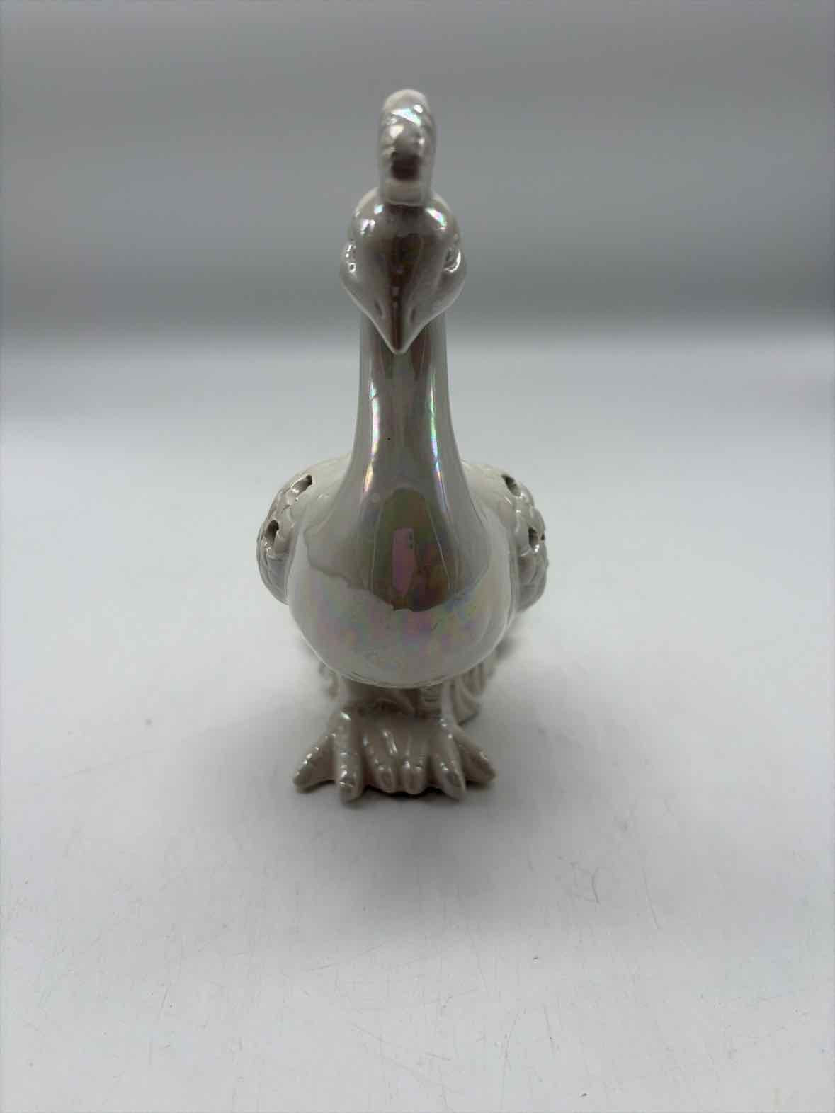 White Iridescent Ceramic Peacock | True Fashionistas.