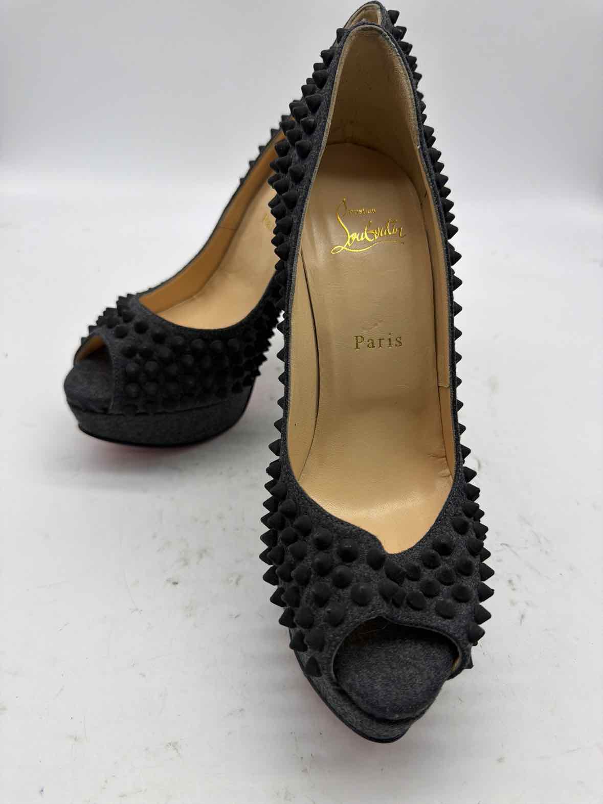 Pre-Owned Christian Louboutin Grey Size 8.5 spike accent Peep Toe Heels | True Fashionistas.