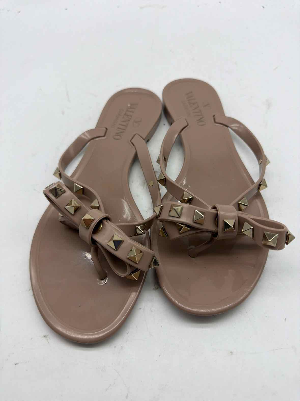 Pre-Owned Valentino Tan Size 36 Jelly Rockstud Thong Sandals | True Fashionistas.