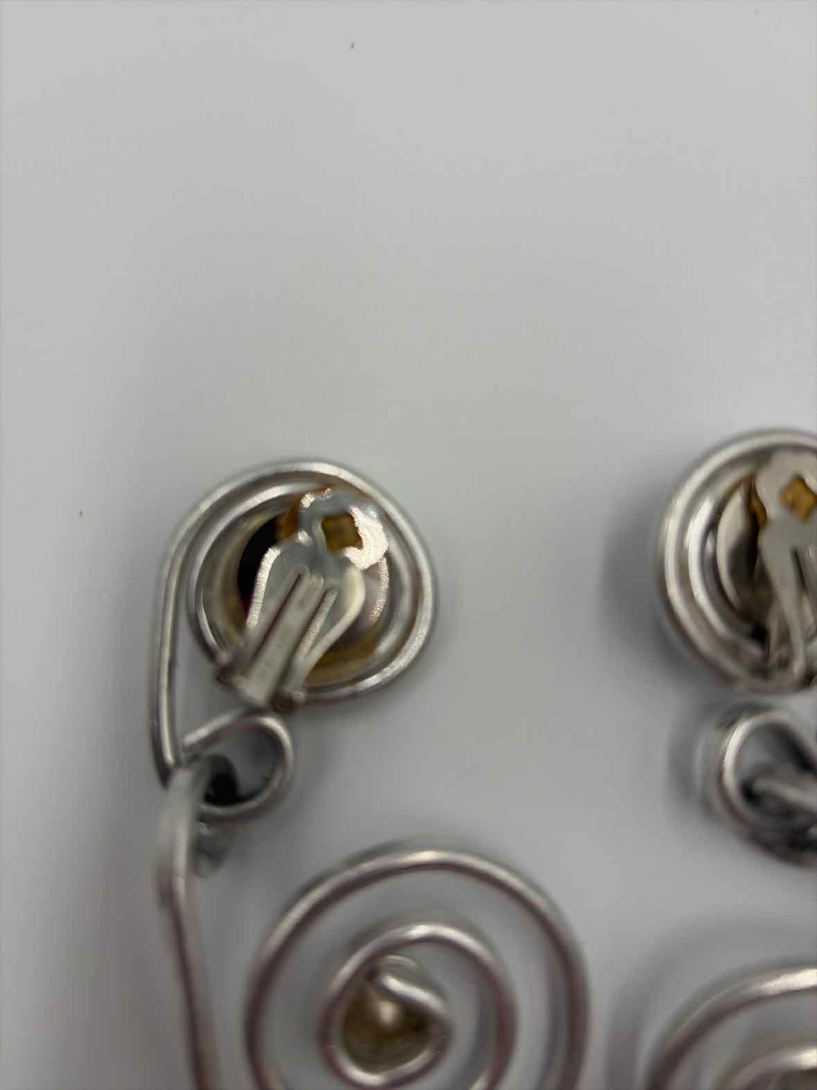 Jeff Lieb Silver clip Drop Earrings | True Fashionistas.