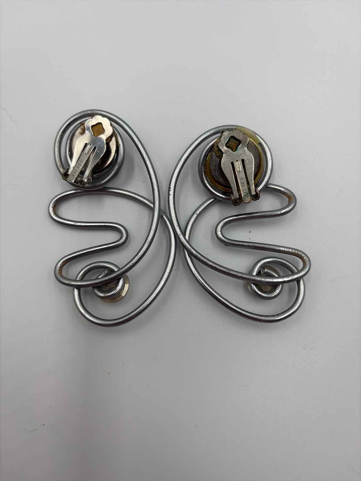 Jeff Lieb Silver clip Drop Earrings | True Fashionistas.