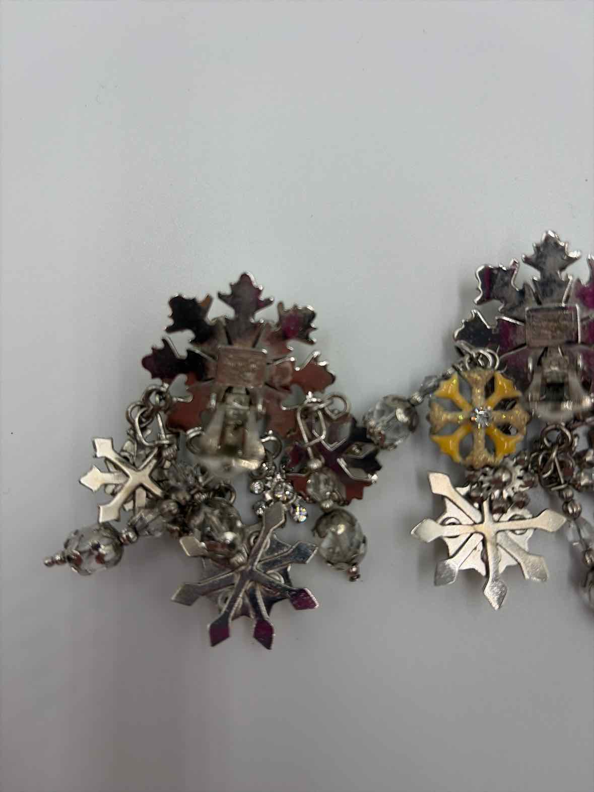 Lunch At The Ritz Silver clip Drop Earrings | True Fashionistas.