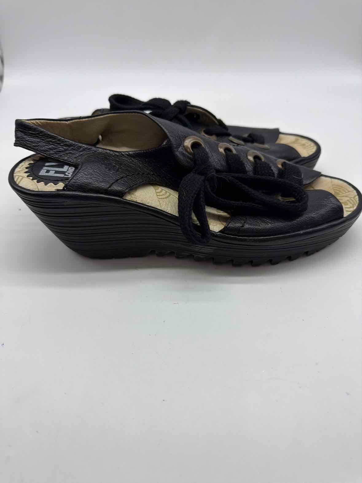 Pre-Owned Fly London Black Size 40 Wedge Heels | True Fashionistas.