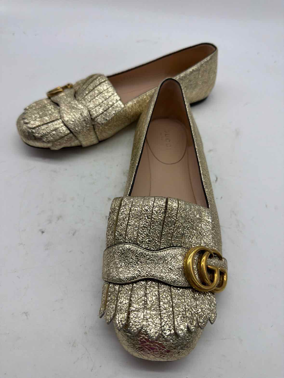 Pre-Owned Gucci Gold Size 6 GG Marmot Fringe Flat Flats | True Fashionistas.