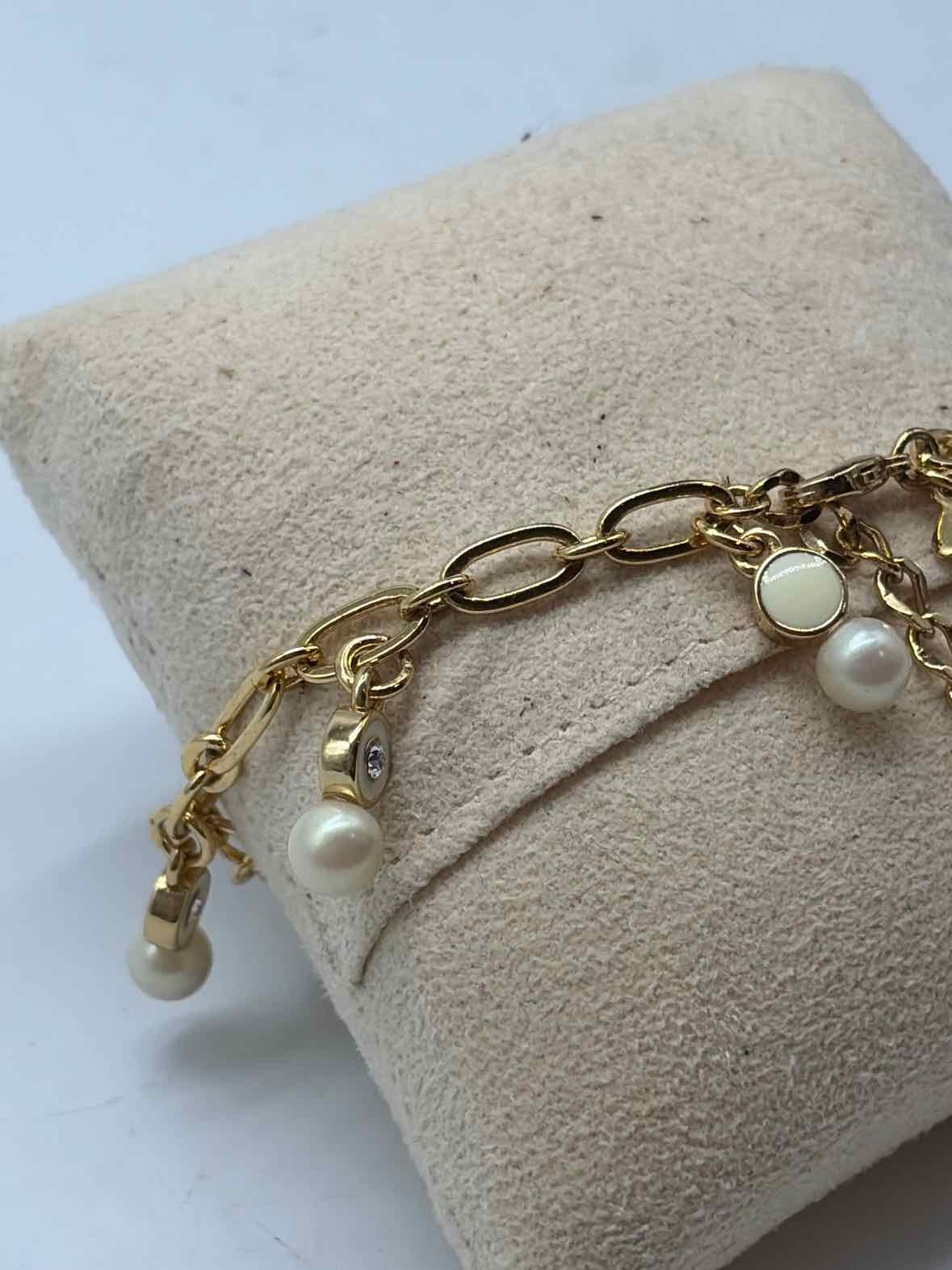 Pre-Owned Kate Spade Gold and White Beads Clasp Bracelet | True Fashionistas.
