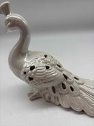 White Iridescent Ceramic Peacock | True Fashionistas.