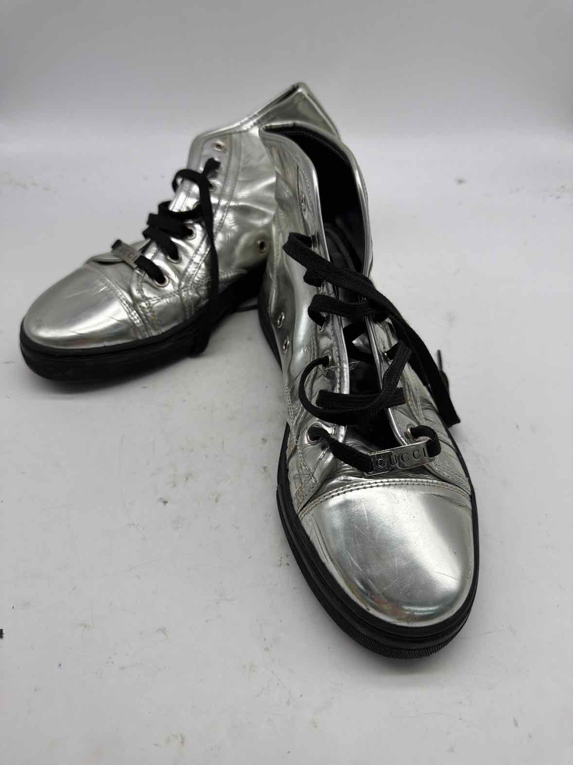 Pre-Owned Gucci Silver Size 9 High Top Athletic Shoes | True Fashionistas.