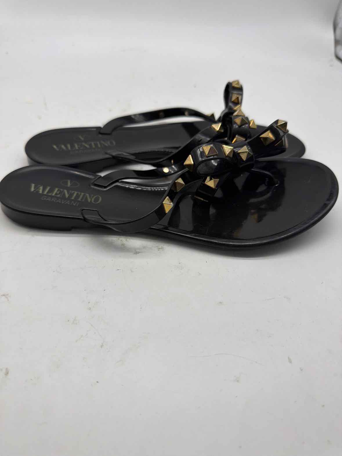 Pre-Owned Valentino Black Size 6 Jelly Rockstud Thong Sandals | True Fashionistas.