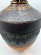 Natalie Blake Orange & Brown Pottery Decorative Pot | True Fashionistas.