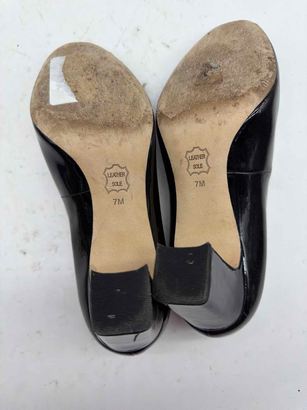 Pre-Owned Tory Burch Black Size 7 Patent Leather Pump Heels | True Fashionistas.