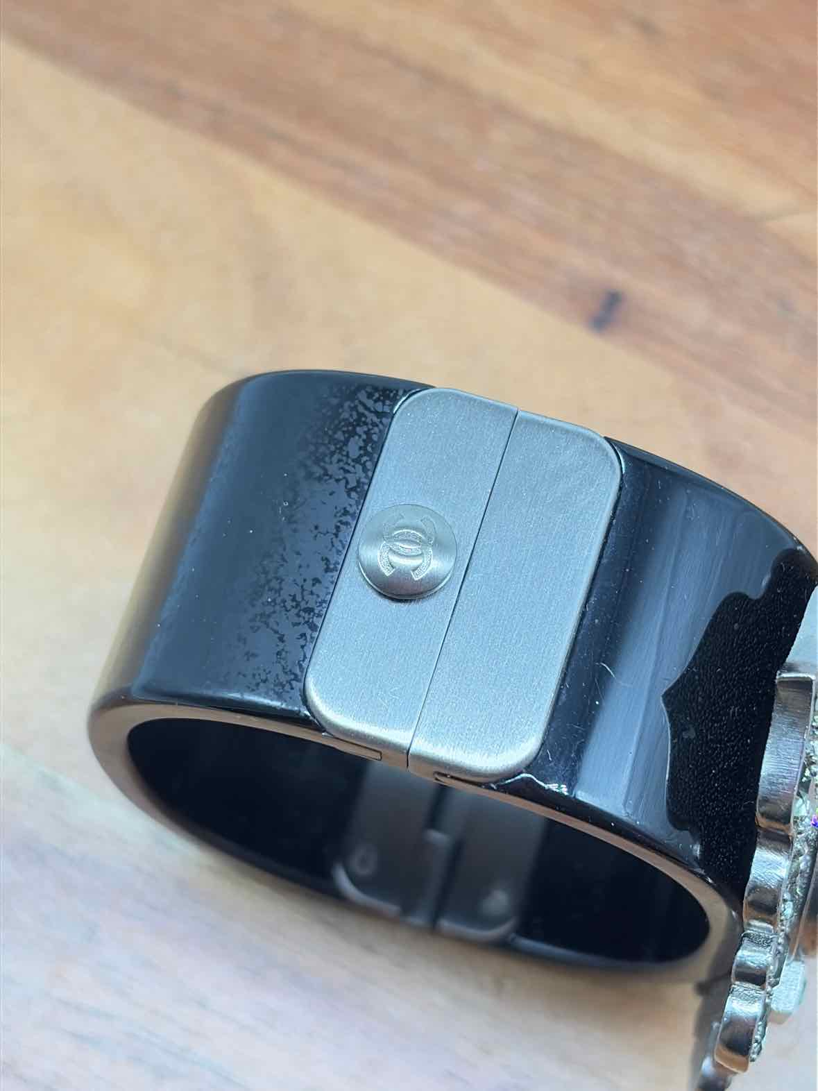 Pre-Owned Chanel Silver and Black Crystal Bangle Bracelet | True Fashionistas.
