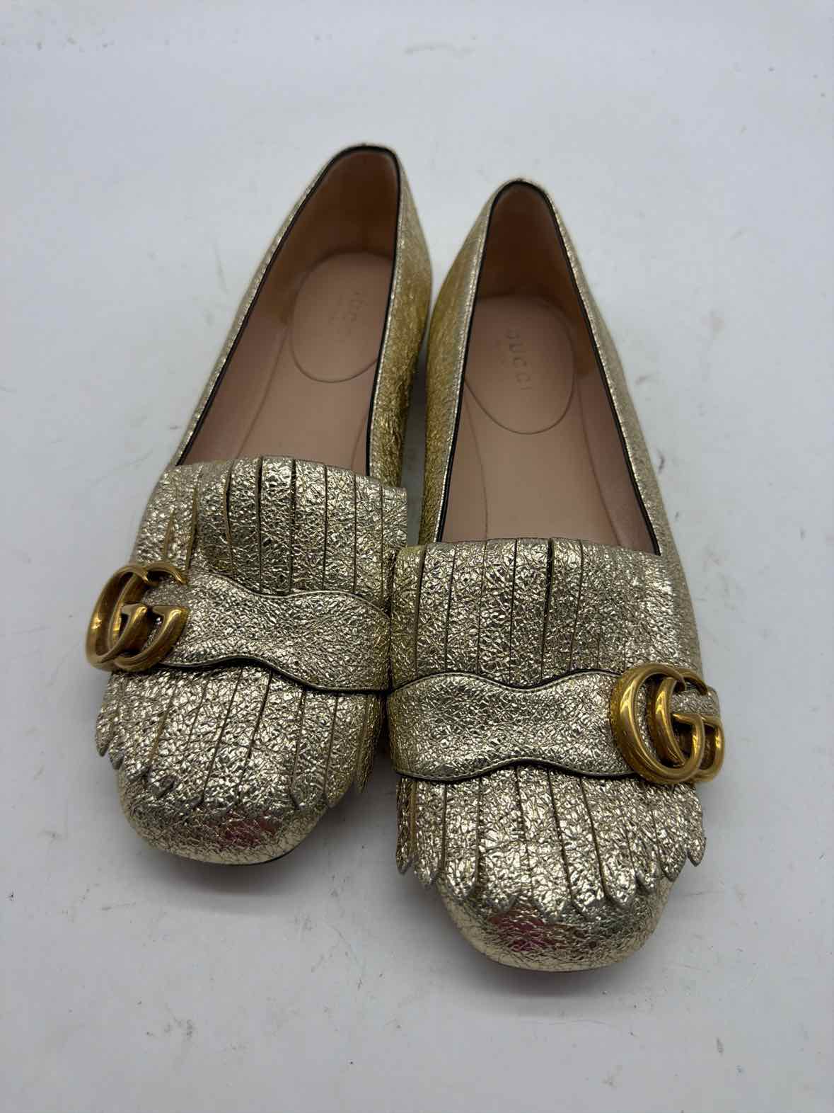 Pre-Owned Gucci Gold Size 6 GG Marmot Fringe Flat Flats | True Fashionistas.