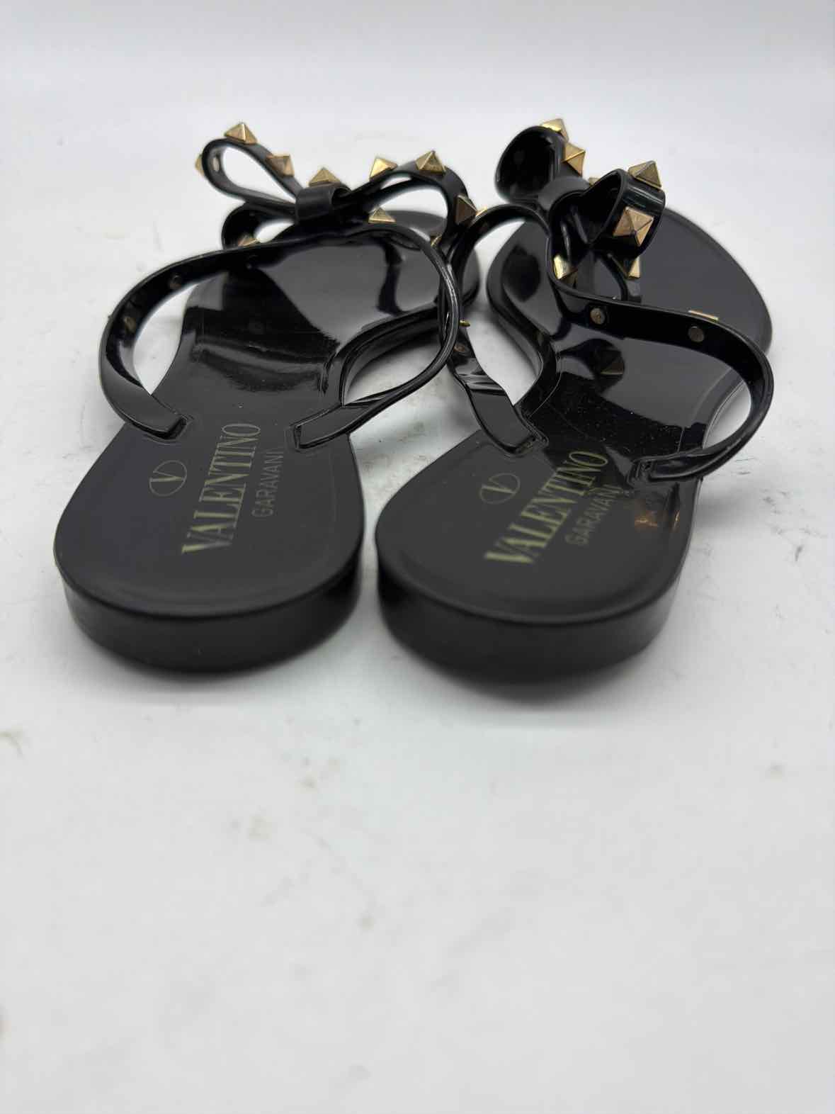 Pre-Owned Valentino Black Size 6 Jelly Rockstud Thong Sandals | True Fashionistas.