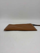 Pre-Owned Michael Kors Tan Clutch Clutch | True Fashionistas.