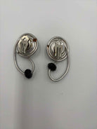 Jeff Lieb Silver clip Drop Earrings | True Fashionistas.