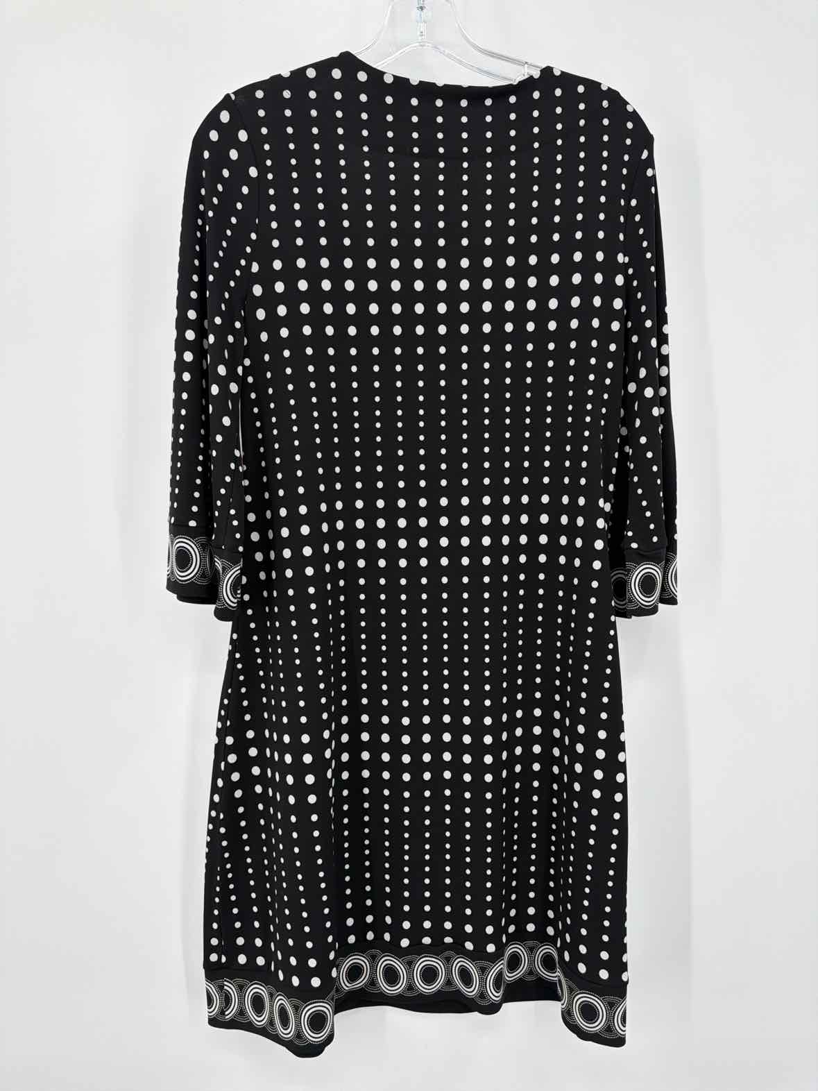Pre-Owned WHBM Black Size Medium Short Long Sleeve Dress | True Fashionistas.