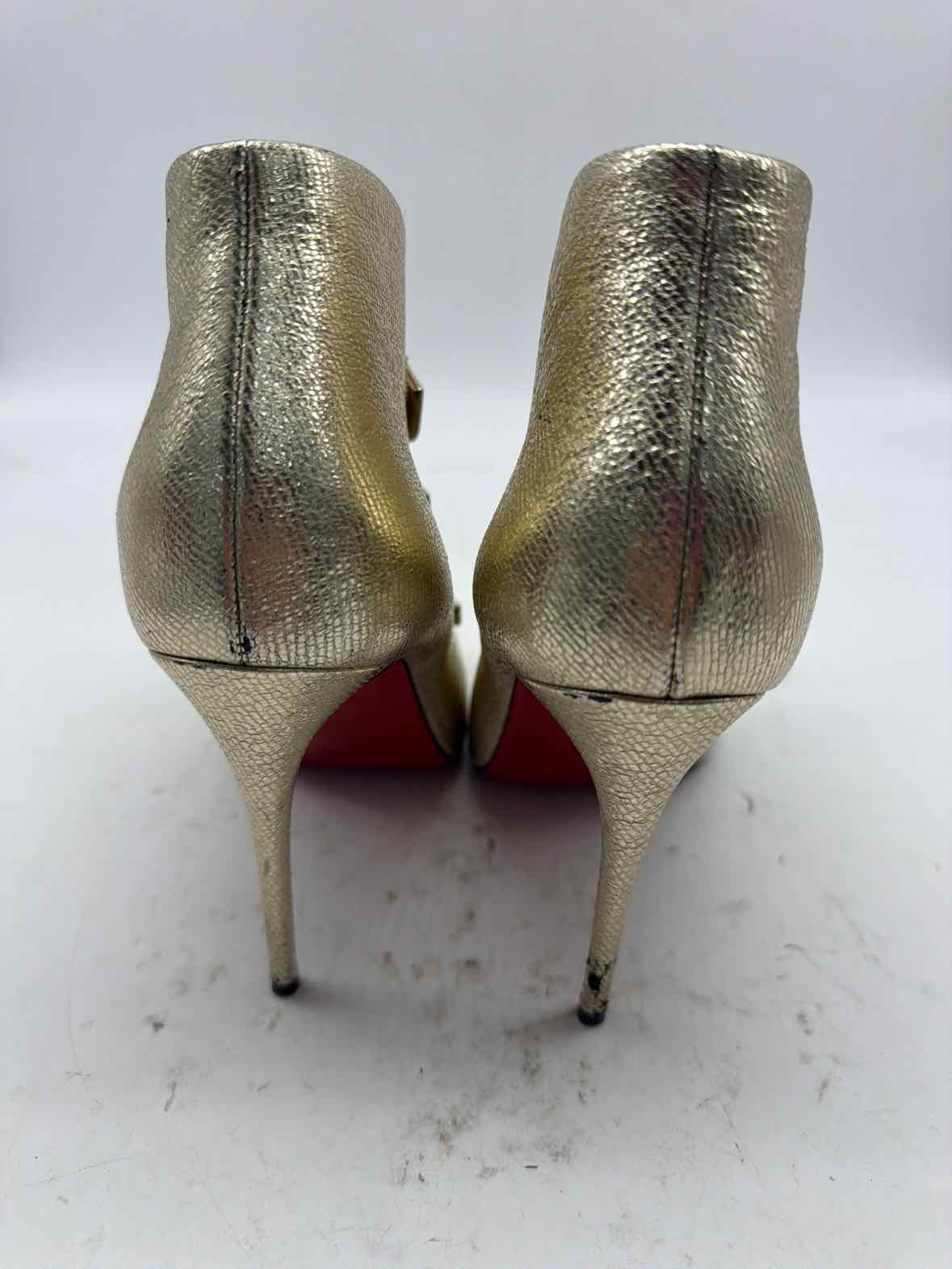 Pre-Owned Christian Louboutin Gold Size 6.5 Ankle Boot Boots | True Fashionistas.