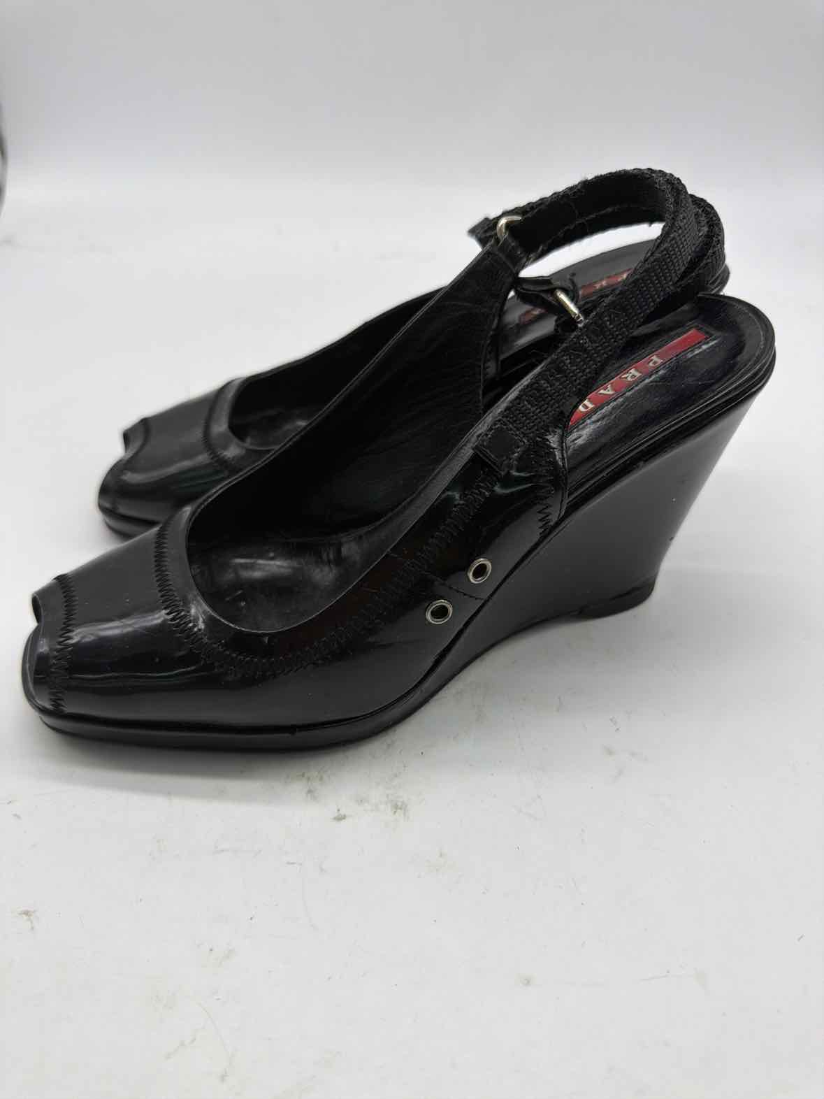 Pre-Owned Prada Black Size 6.5 Patent Leather Wedge Heels | True Fashionistas.