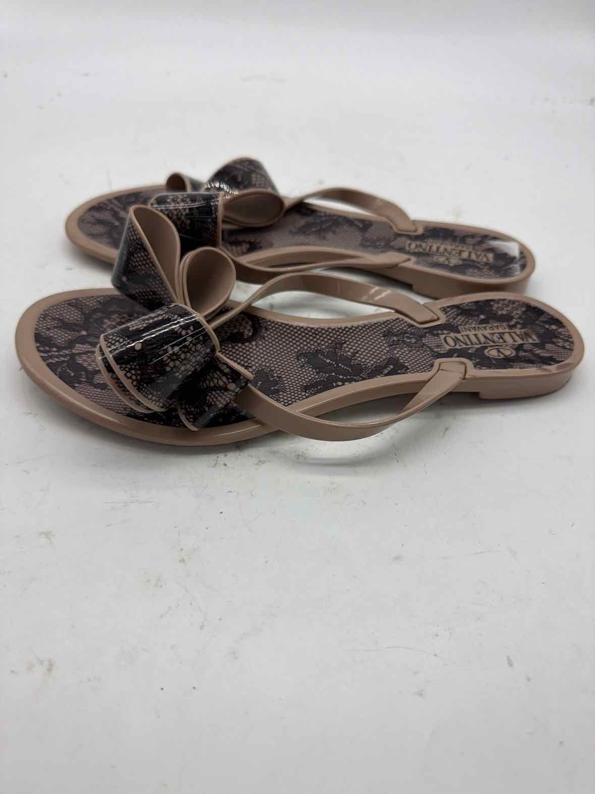 Pre-Owned Valentino Tan Size 7 Jelly Thong Sandals | True Fashionistas.