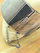 Coach Gunmetal Turnlock Bangle Bracelet | True Fashionistas.