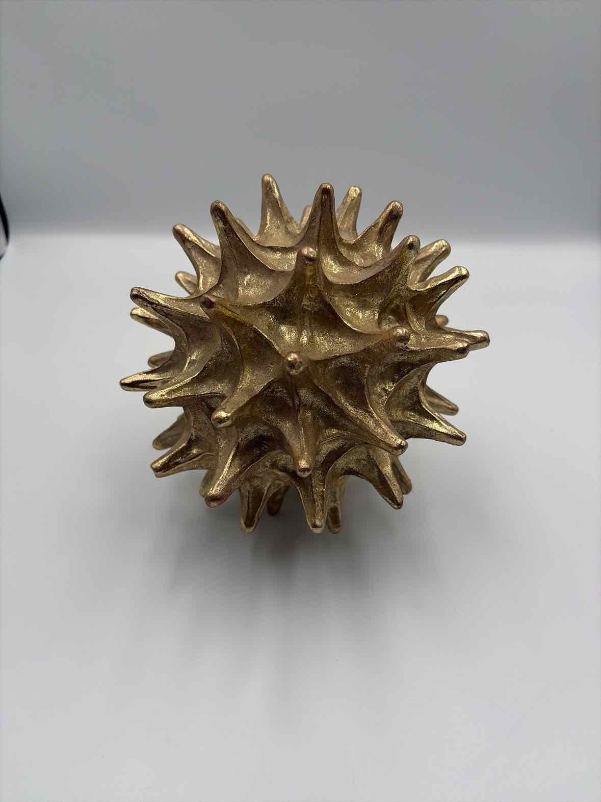 Gold spiky Sculpture | True Fashionistas.
