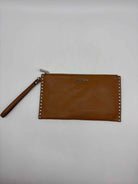 Pre-Owned Michael Kors Tan Clutch Clutch | True Fashionistas.
