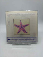 Blue Poppy Starfish Needlepoint | True Fashionistas.