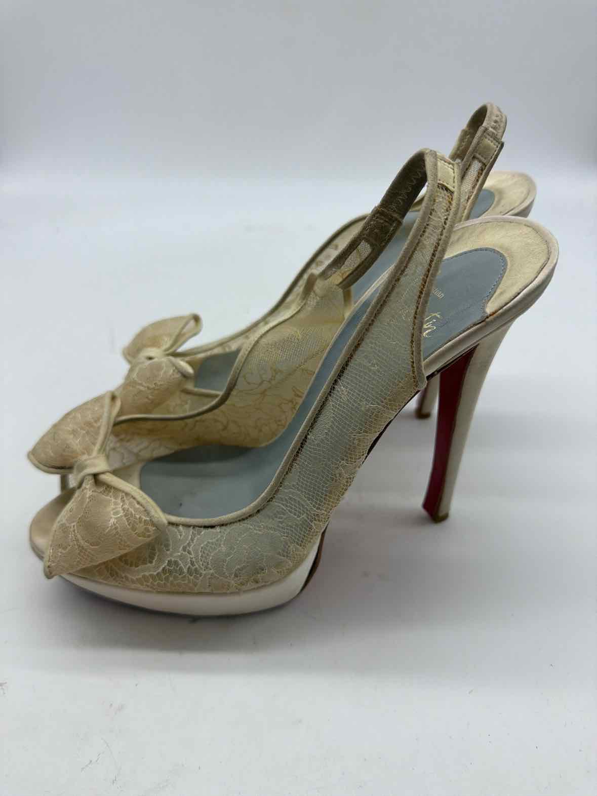 Pre-Owned Christian Louboutin Ivory Size 9 Lace Stiletto Heels | True Fashionistas.