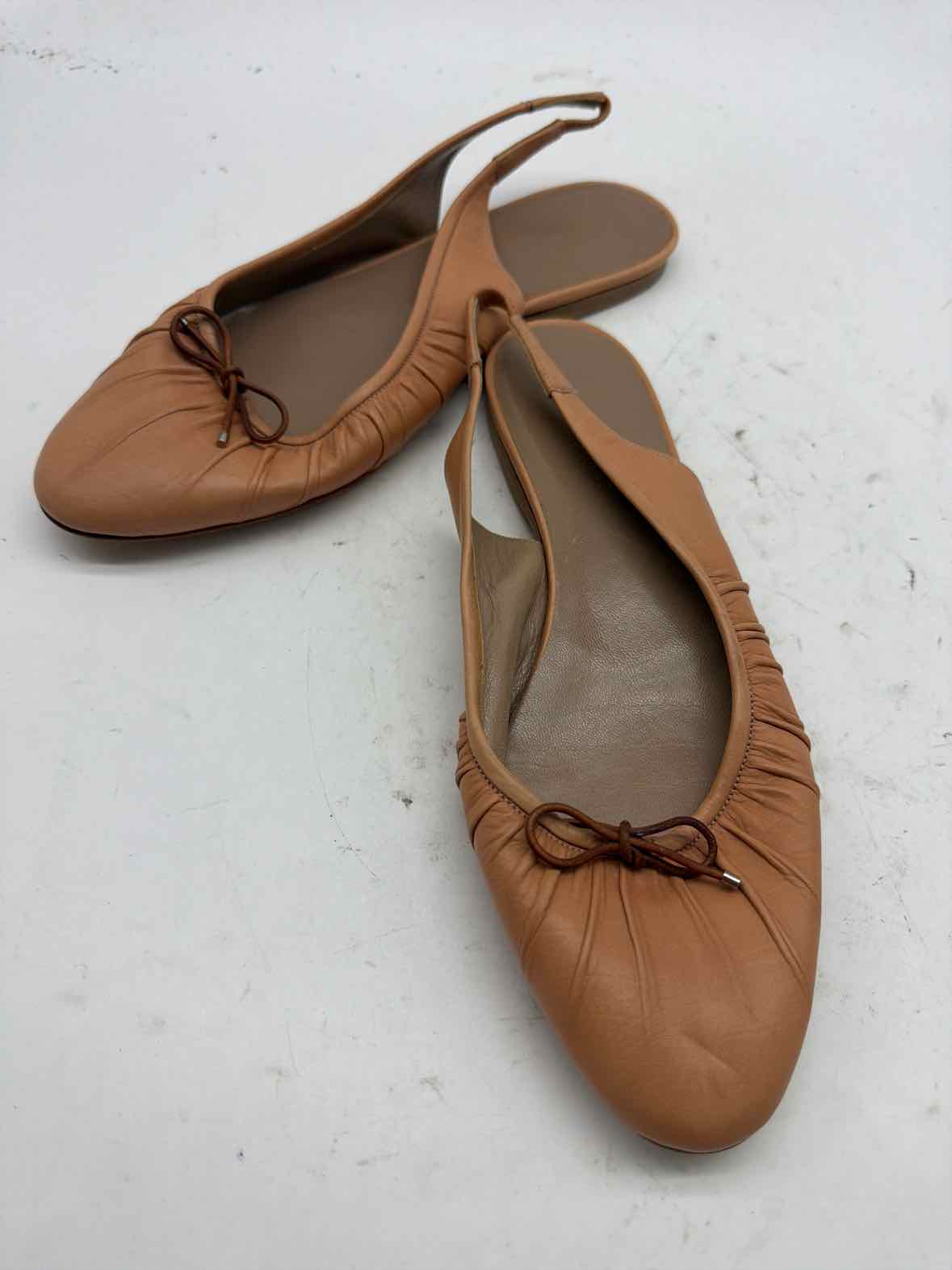 Pre-Owned Hermes Tan Size 9 Vintage Ribbon Ballerina Slingback Flats | True Fashionistas.