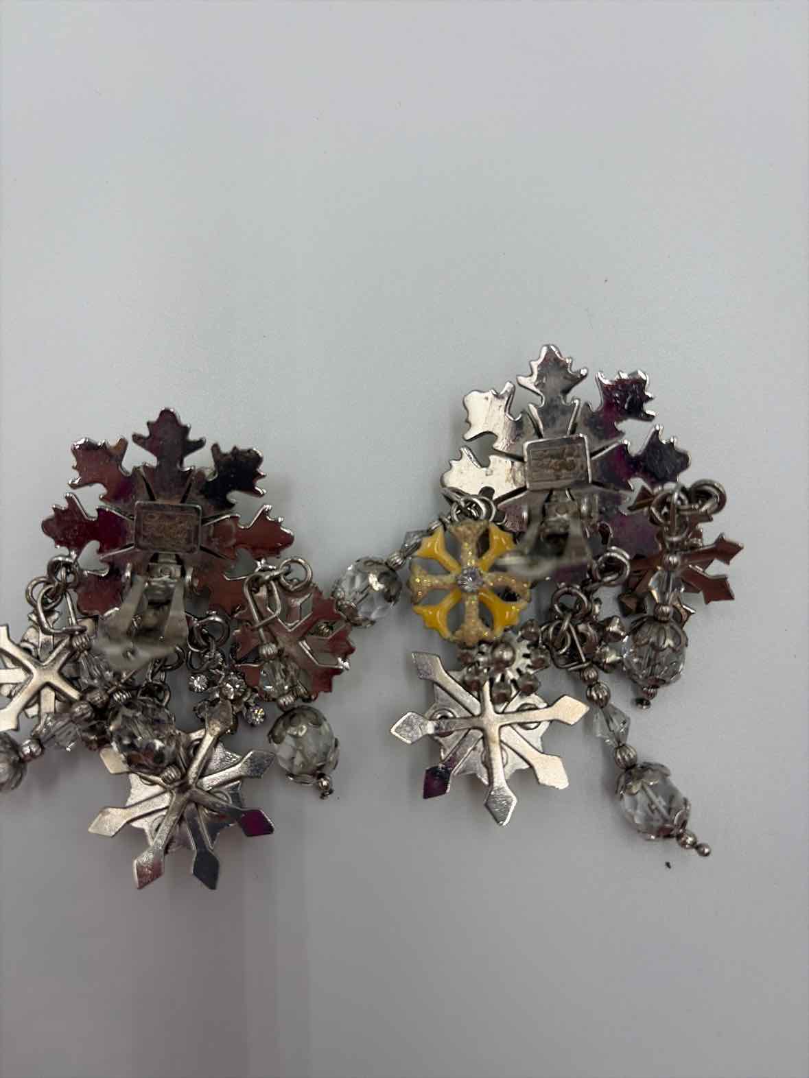 Lunch At The Ritz Silver clip Drop Earrings | True Fashionistas.