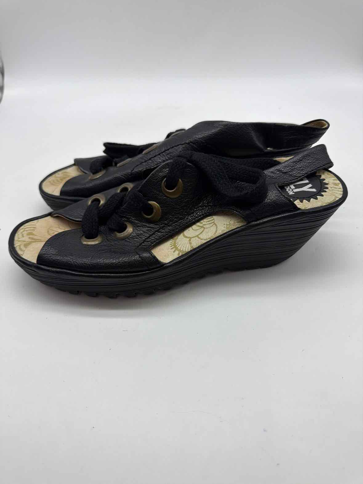 Pre-Owned Fly London Black Size 40 Wedge Heels | True Fashionistas.