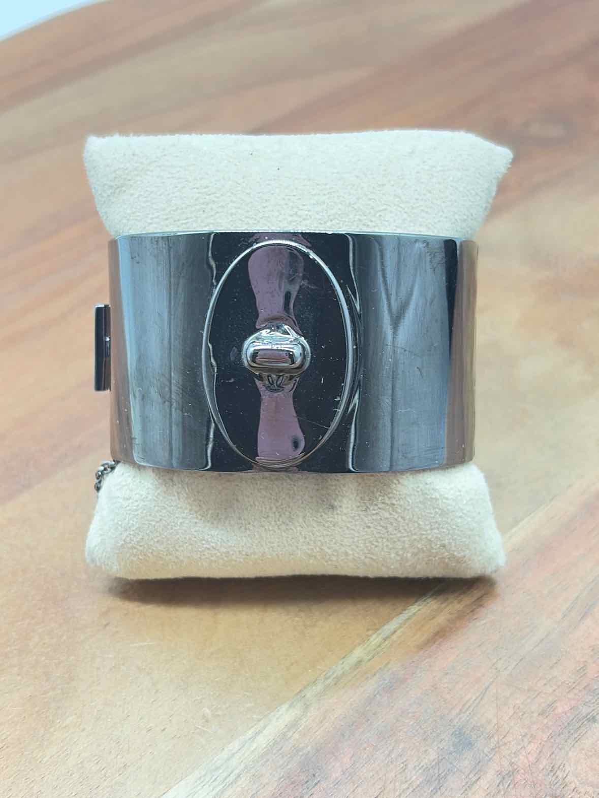 Coach Gunmetal Turnlock Bangle Bracelet | True Fashionistas.