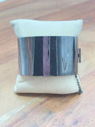 Coach Gunmetal Turnlock Bangle Bracelet | True Fashionistas.