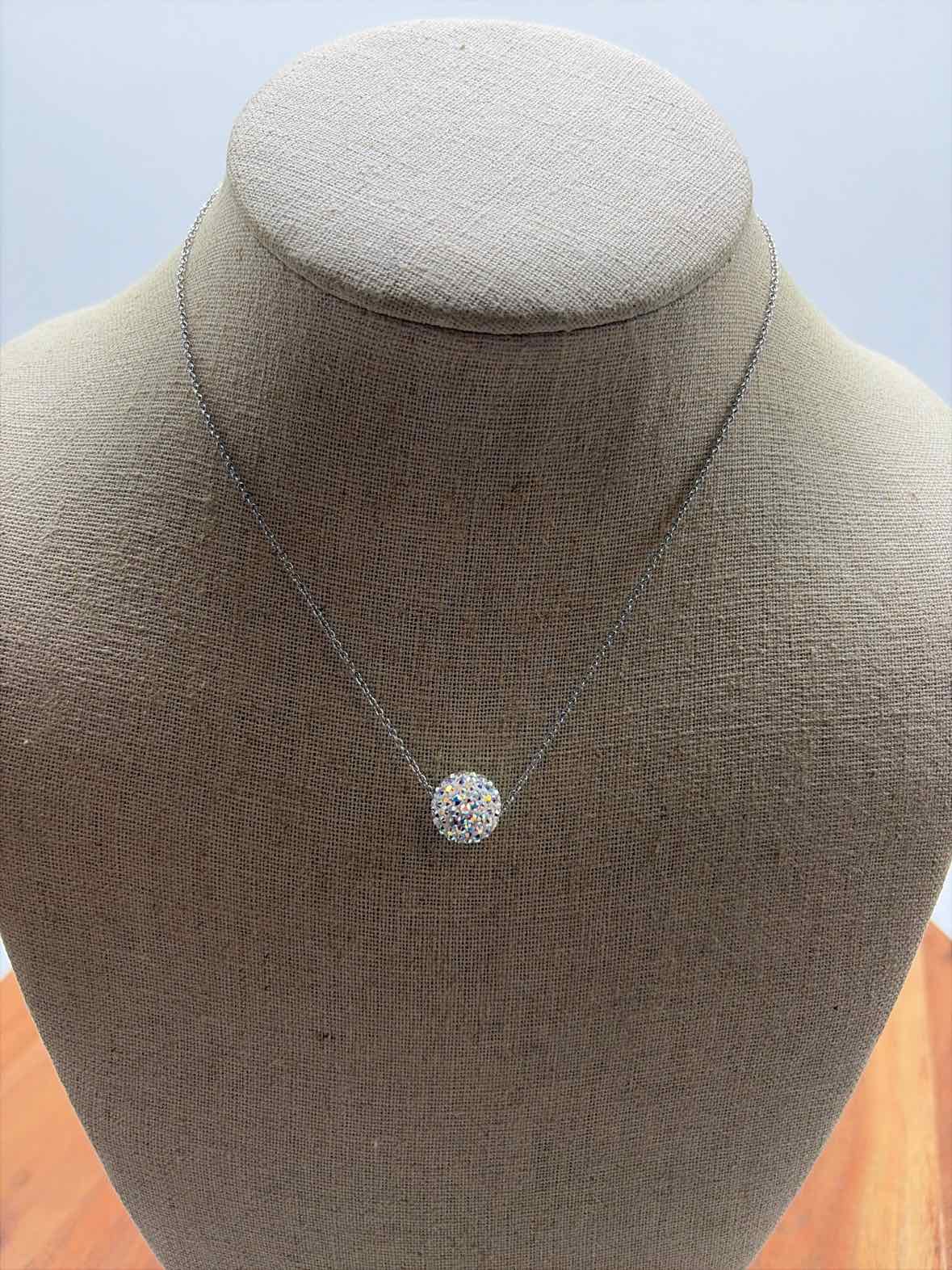 Touchstone Crystal (TCS) Silver Ball Pendant Necklace | True Fashionistas.