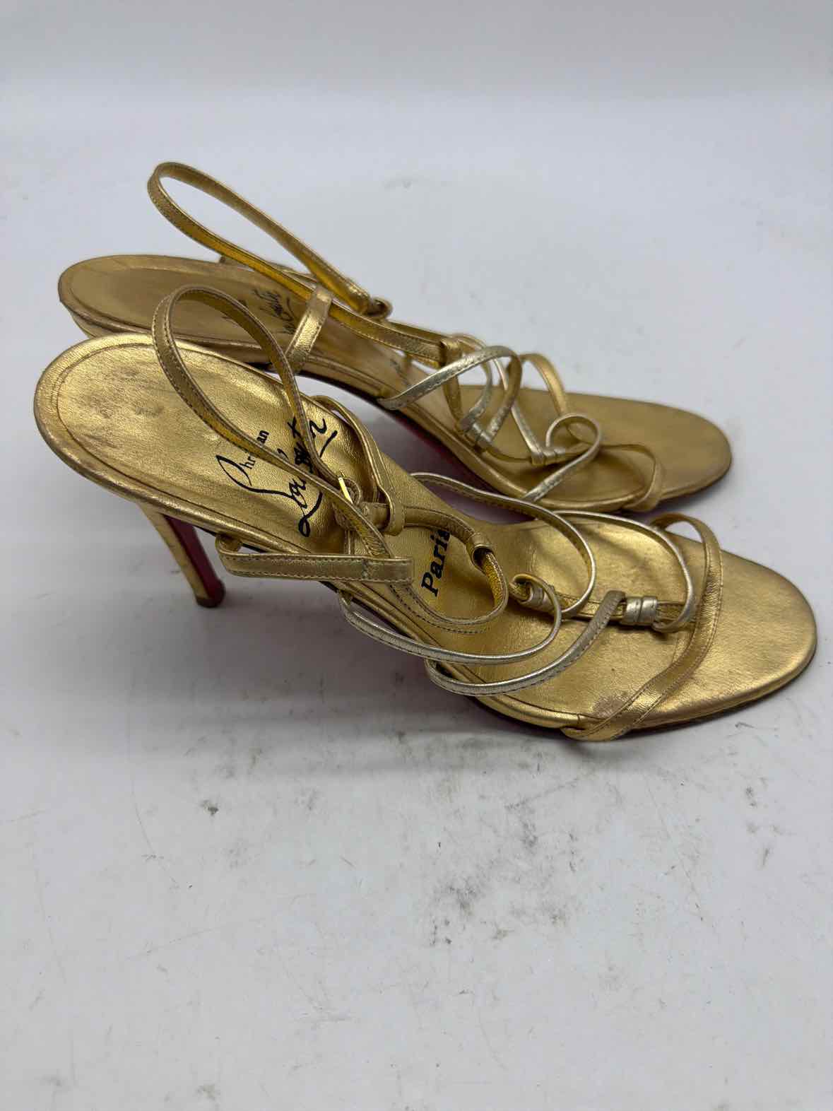 Pre-Owned Christian Louboutin Gold Size 8 Strappy Heels | True Fashionistas.