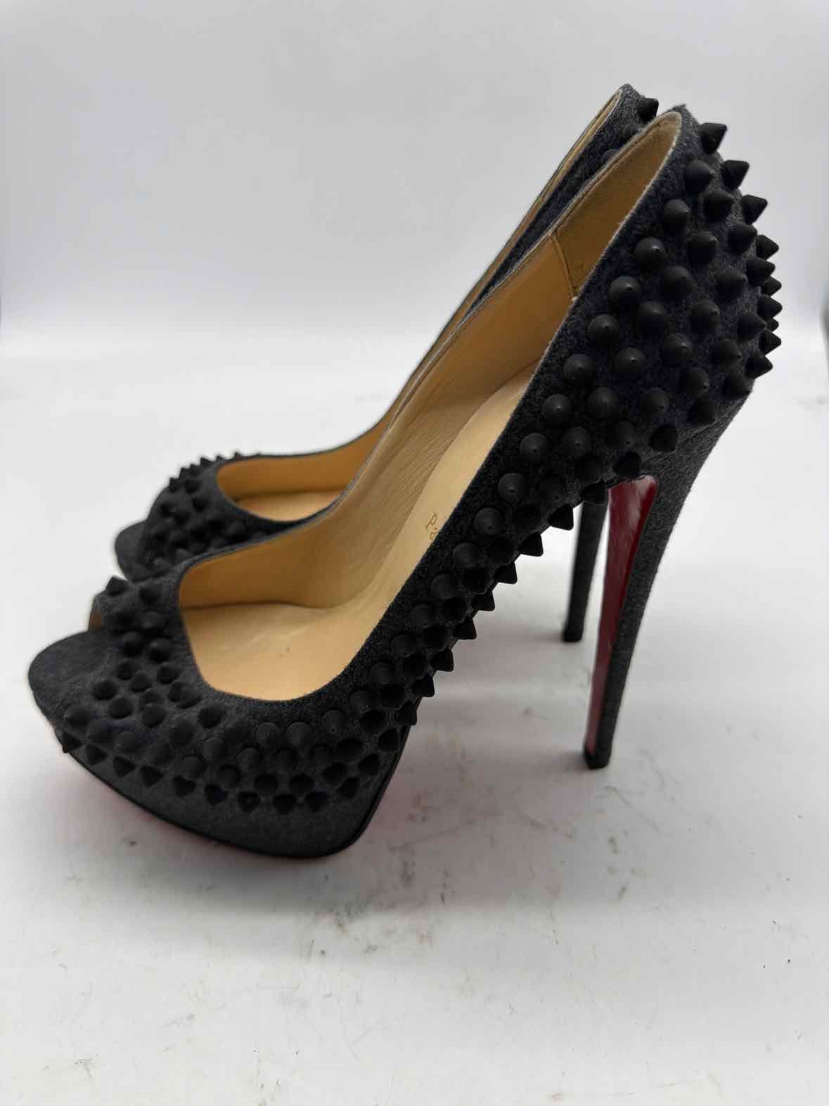 Pre-Owned Christian Louboutin Grey Size 8.5 spike accent Peep Toe Heels | True Fashionistas.