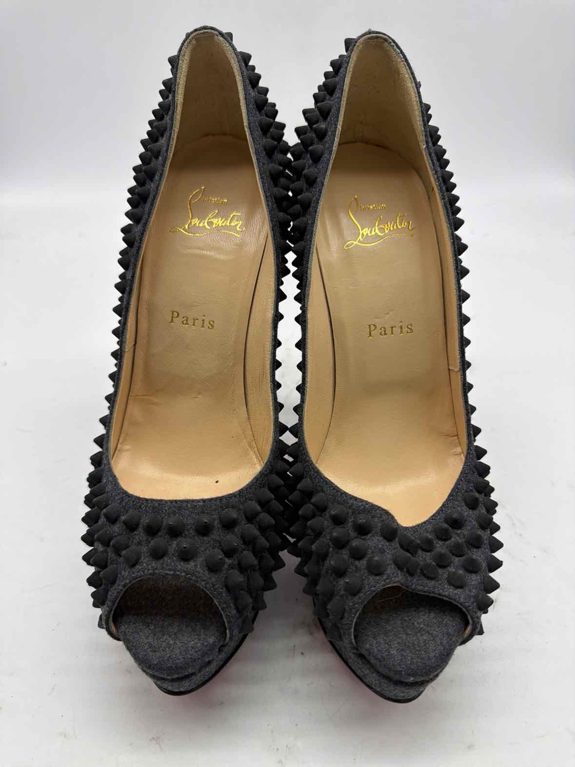 Pre-Owned Christian Louboutin Grey Size 8.5 spike accent Peep Toe Heels | True Fashionistas.