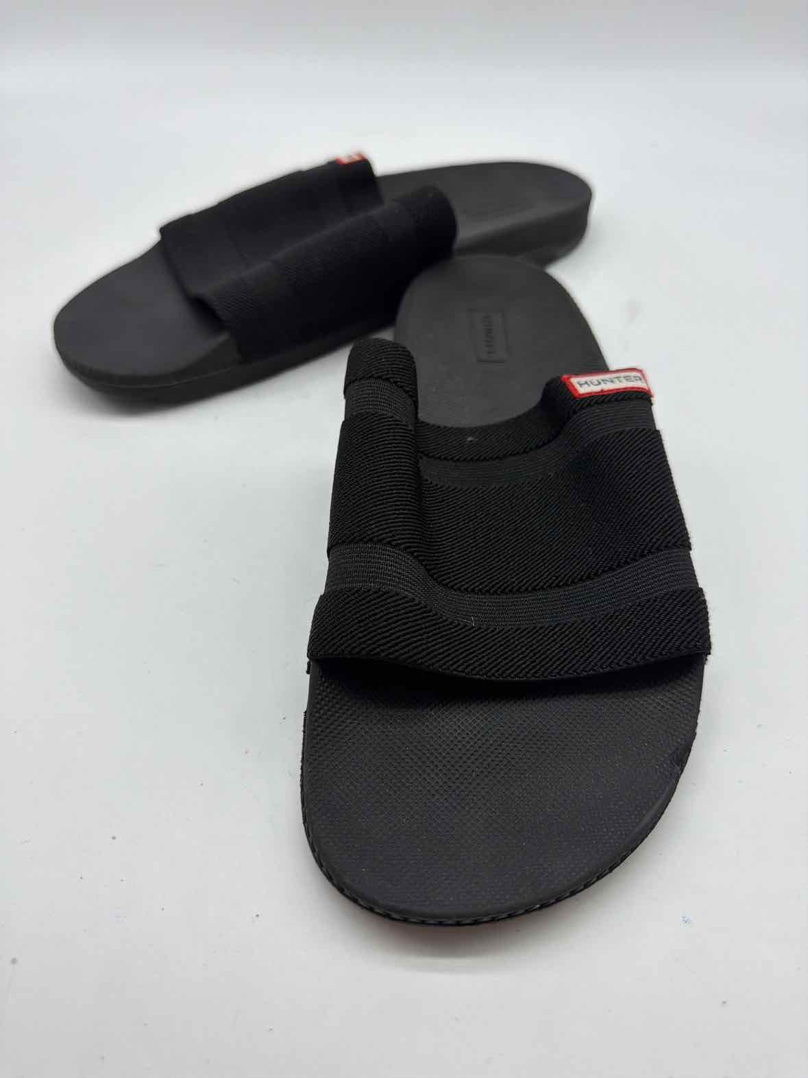 Pre-Owned Hunter Black Size 9 Slide Heels | True Fashionistas.