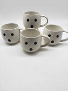 Set Of 4 Pottery Barn Ghost Halloween mugs | True Fashionistas.