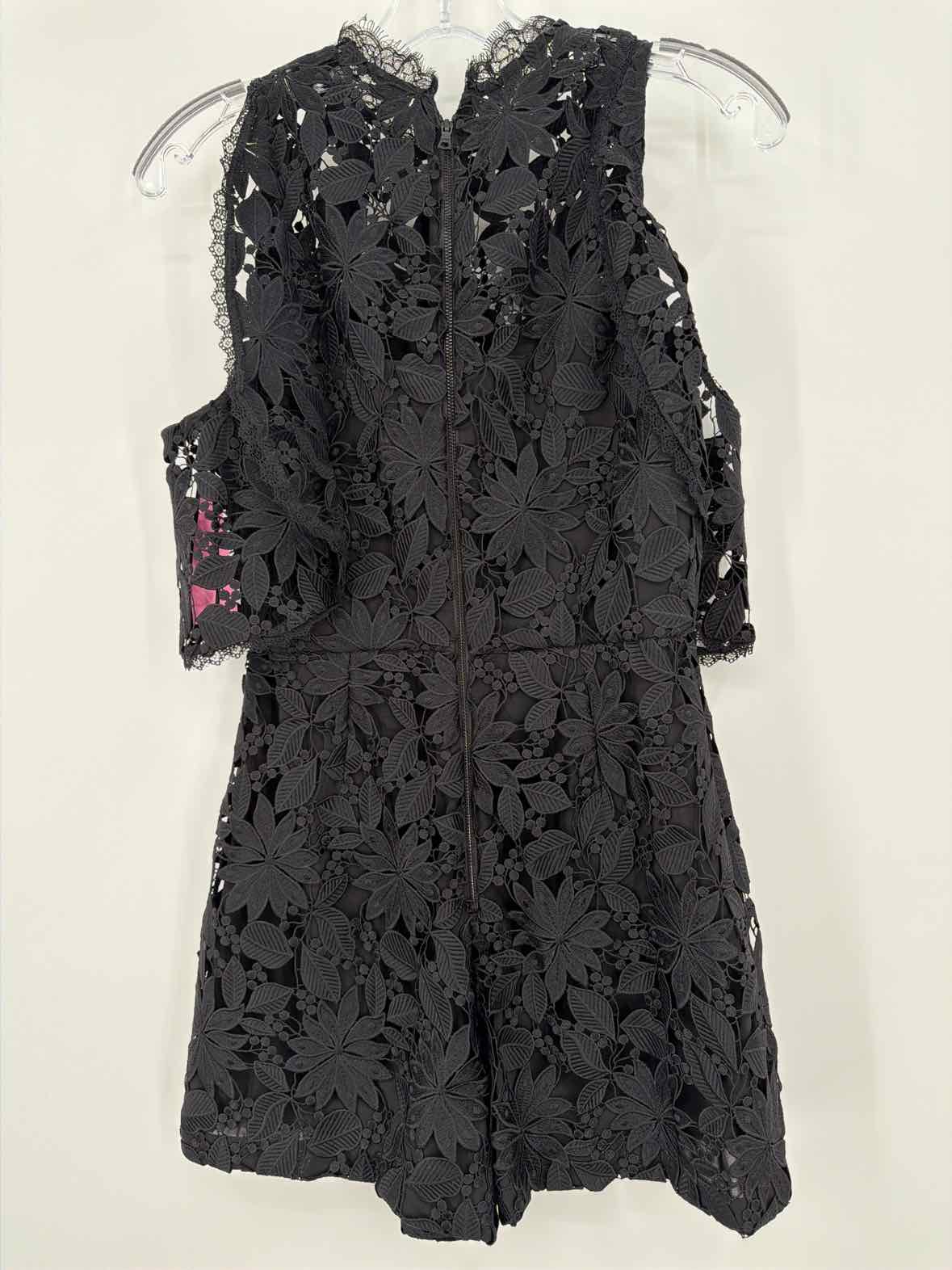 Pre-Owned Alice + Olivia Black Size 2 Lace Long Sleeve Romper | True Fashionistas.