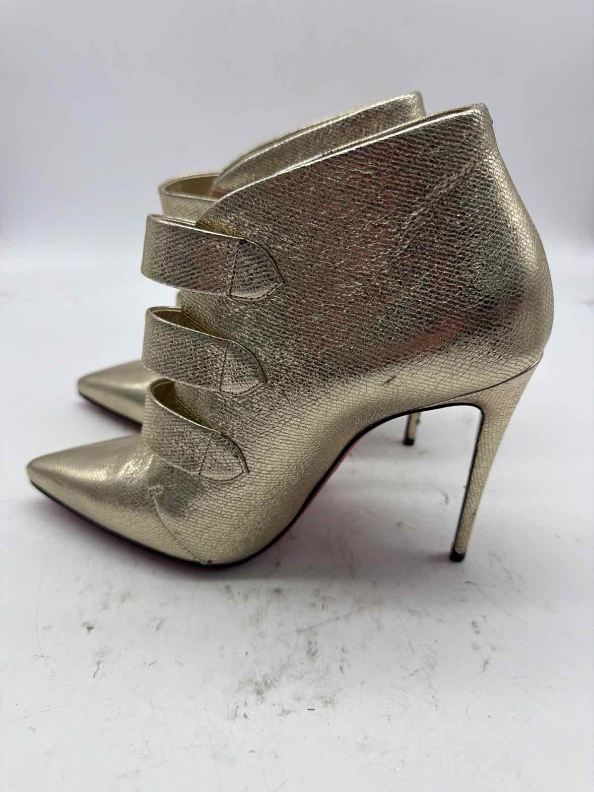 Pre-Owned Christian Louboutin Gold Size 6.5 Ankle Boot Boots | True Fashionistas.