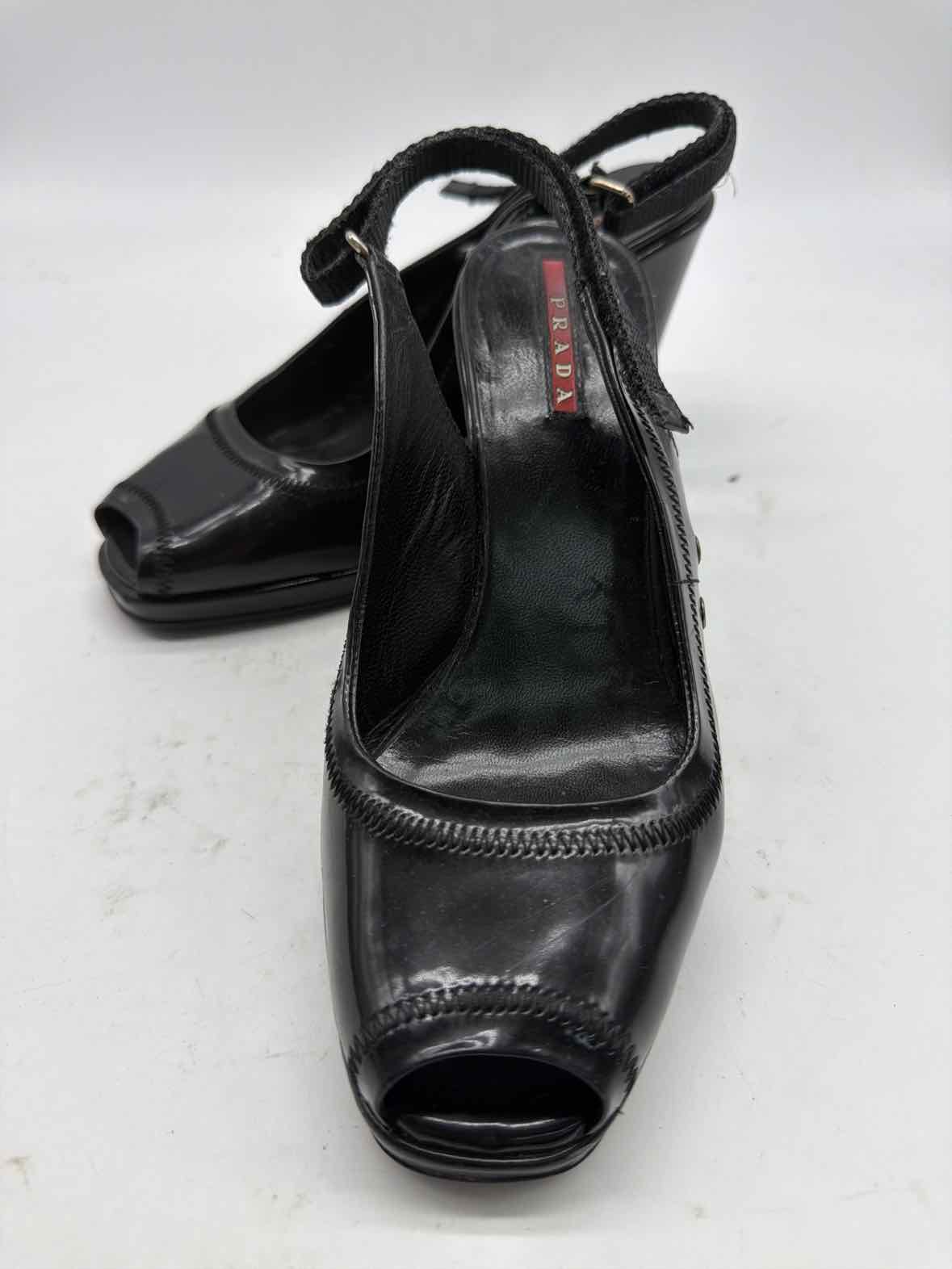 Pre-Owned Prada Black Size 6.5 Patent Leather Wedge Heels | True Fashionistas.